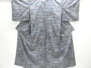 未使用品　横段に花唐草模様織出し本場泥大島紬着物（5マルキ）